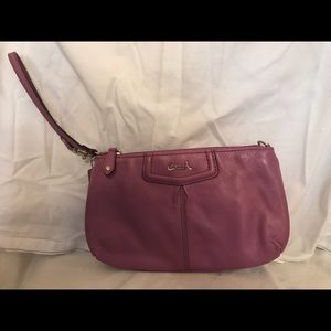 Violet/light purple Coach wristlet
